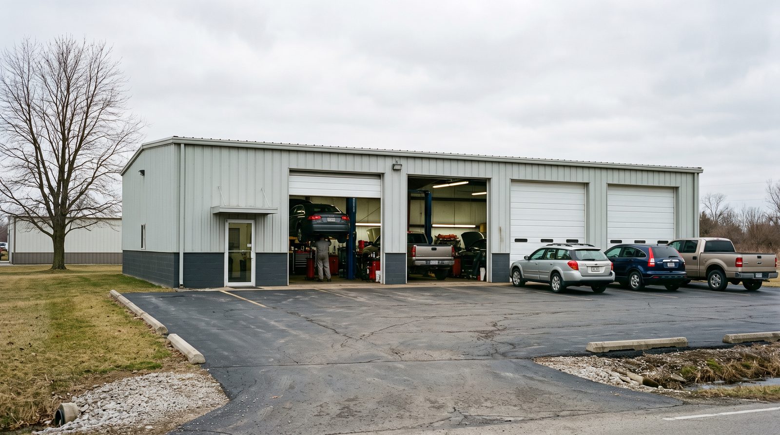 The exterior of the Atomic City shop with its bay doors open